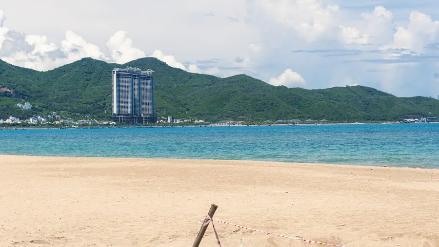 ATM machine Nha Trang Vietnam tourist withdrawing cash