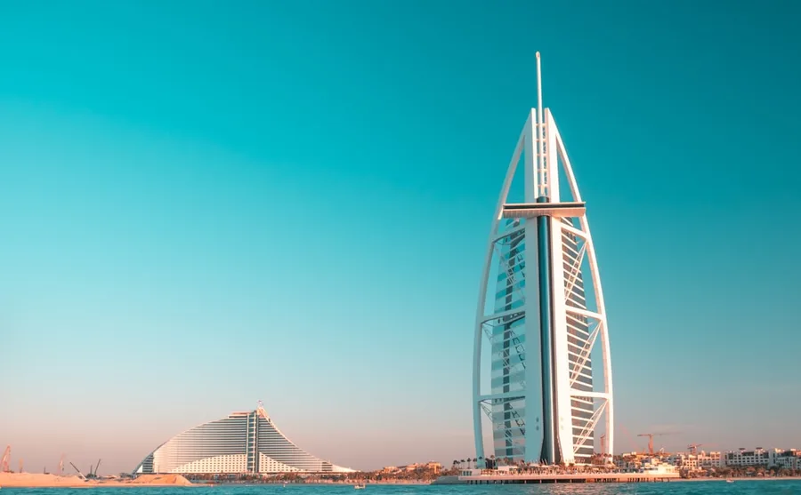 crypto payment flight ticket Dubai UAE senior traveler budget