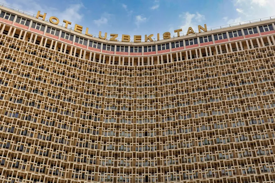 Hotel check-in deposit cash sum Uzbekistan