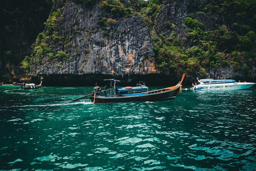 digital crypto wallet and Thai baht banknotes Phuket Thailand