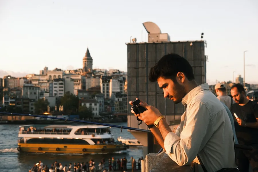 Tourist in Istanbul using smartphone with eSIM
