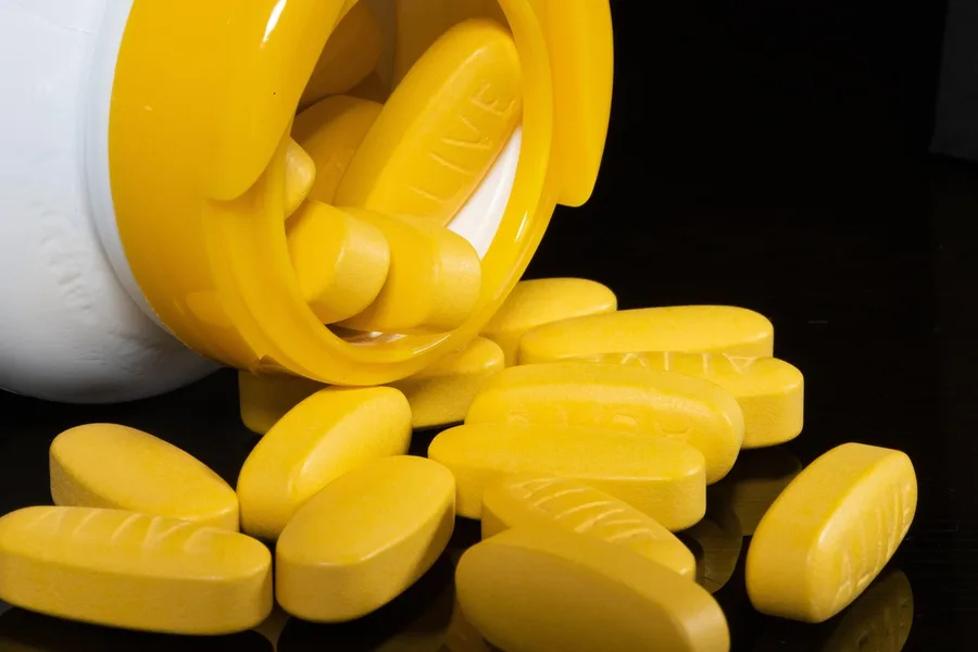 inexpensive generic drug brands on shelf in Kuwaiti pharmacy