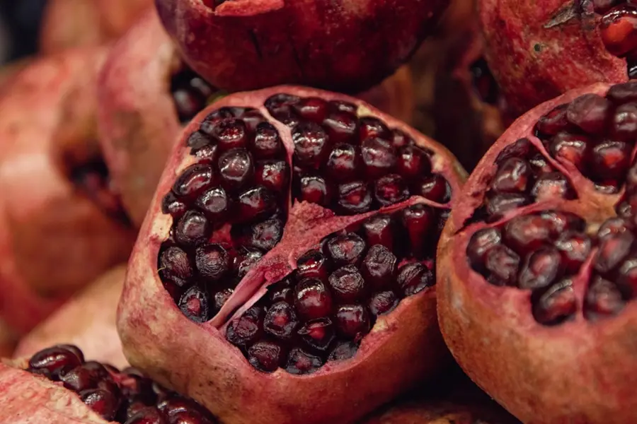 Sadarak market Baku fresh pomegranates herbs stall 2026