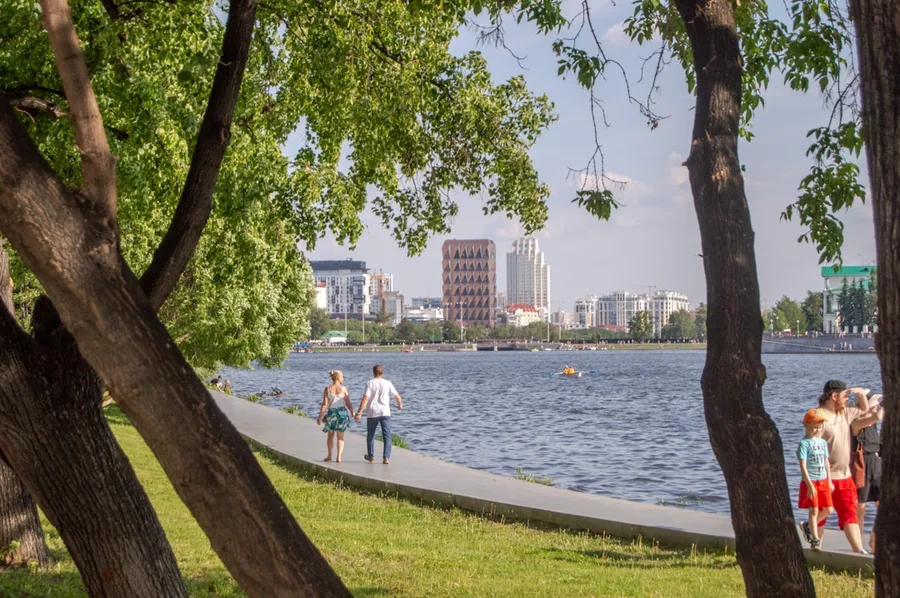 Ekaterinburg Iset river embankment walking with dog Russia Oman