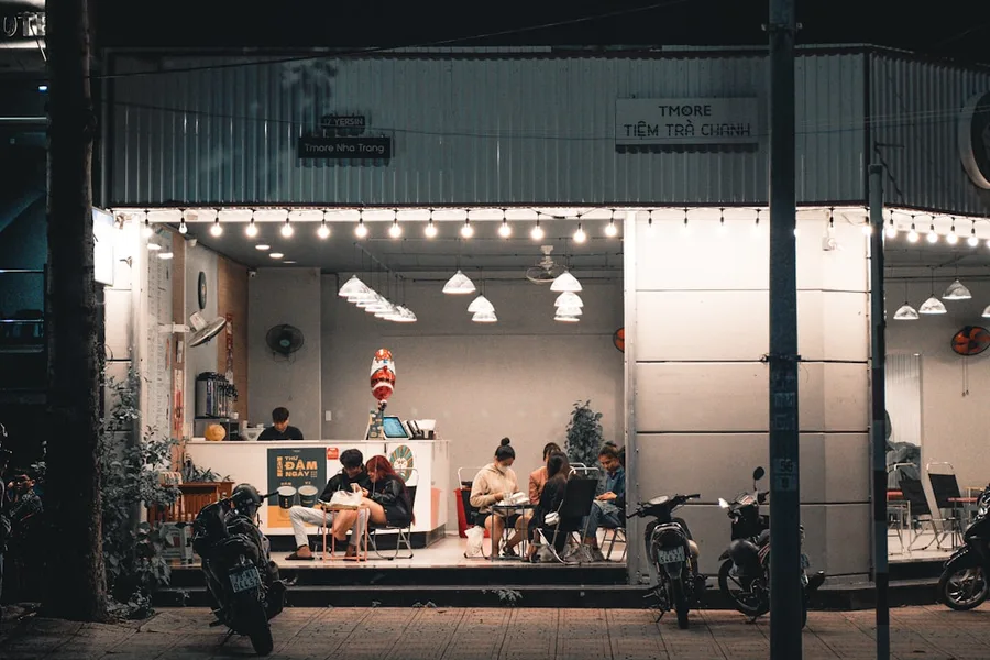 freelancer working laptop Nha Trang cafe Vietnam