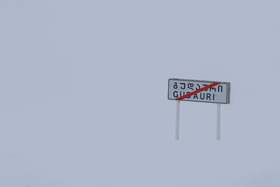 Kazbegi road closed snow sign Georgia winter