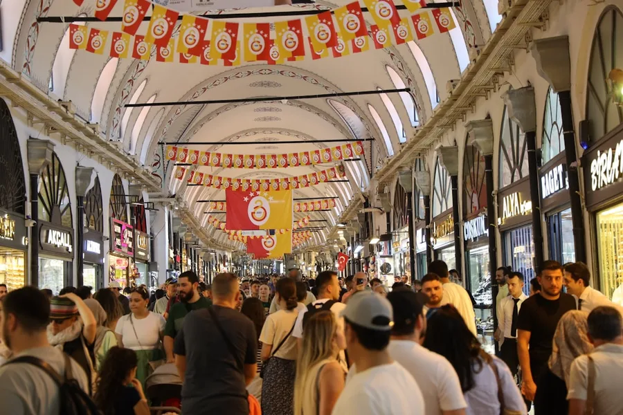 Family with children exchanging money Grand Bazaar Istanbul