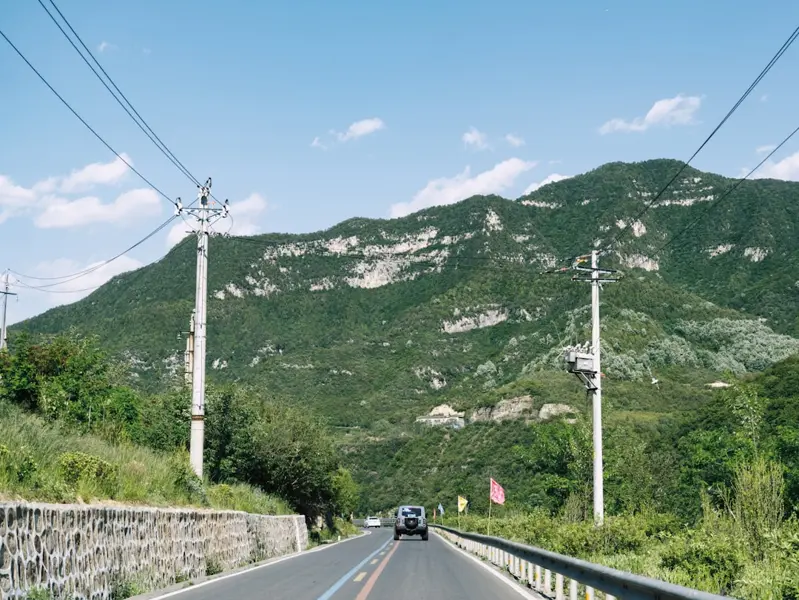 Georgian taxi driver negotiating price rural mountains