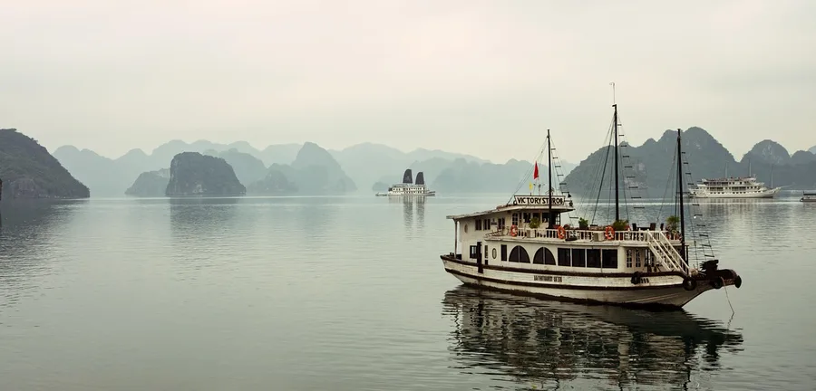 senior couple enjoying view from budget flight over Halong Bay Vietnam Kos Greece