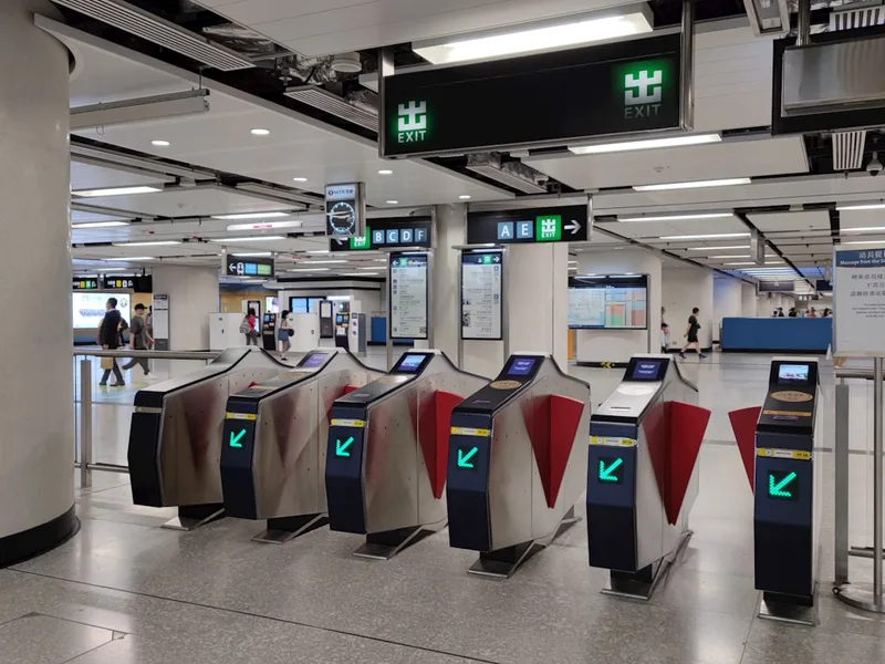 Hong Kong MTR station fare gate surcharge paid zone budget travel