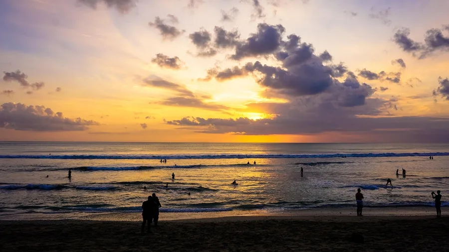 Tourist drinking alcohol on Kuta beach fined Bali Indonesia Osh Kyrgyzstan