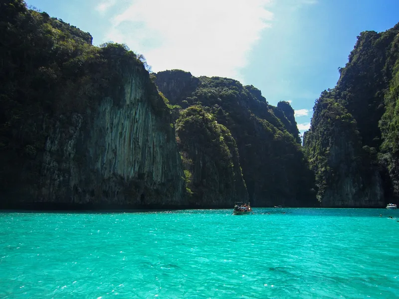 crypto payment travel insurance USDT Phuket Thailand Osh Kyrgyzstan