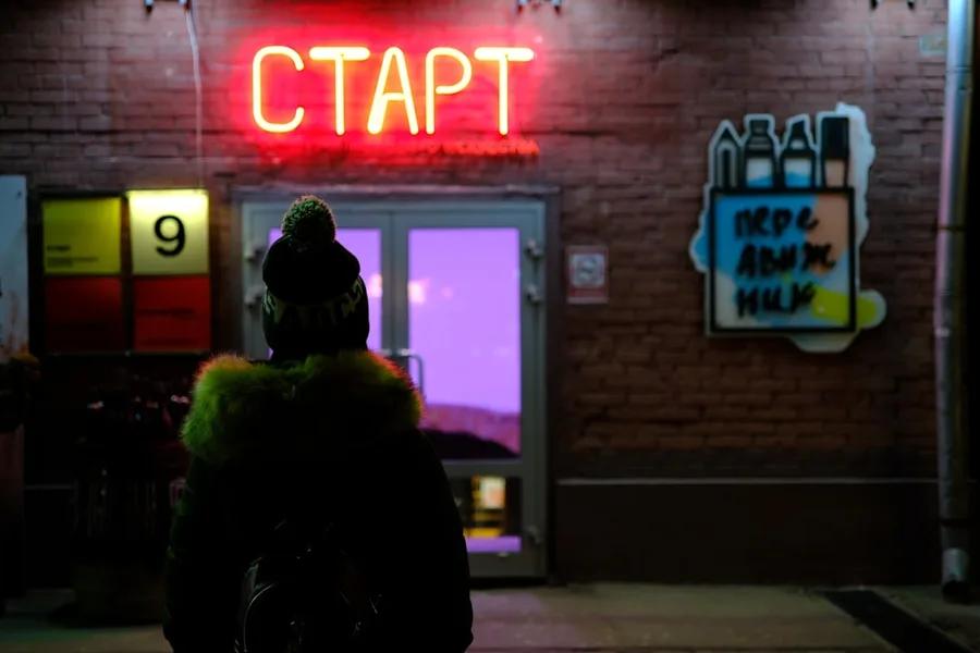 solo female traveler examining cafe check Moscow Russia