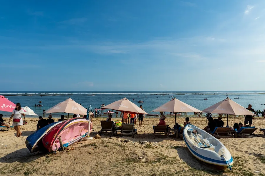 connecting flights luggage fee surfboard Indonesia 2026 Bali Indonesia