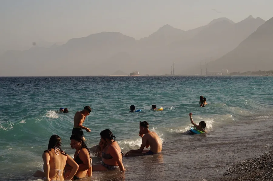 Antalya beach Konyaalti family with child Turkey Kotor Montenegro