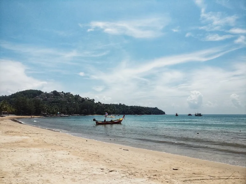digital nomad working on beach Phuket laptop