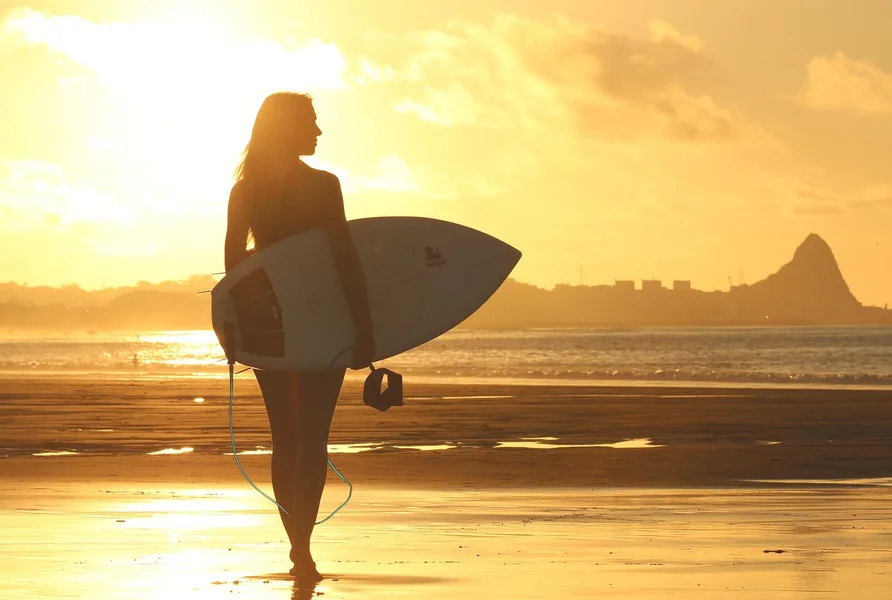 surfer paying with crypto card in Antalya beach 2027 zero fees