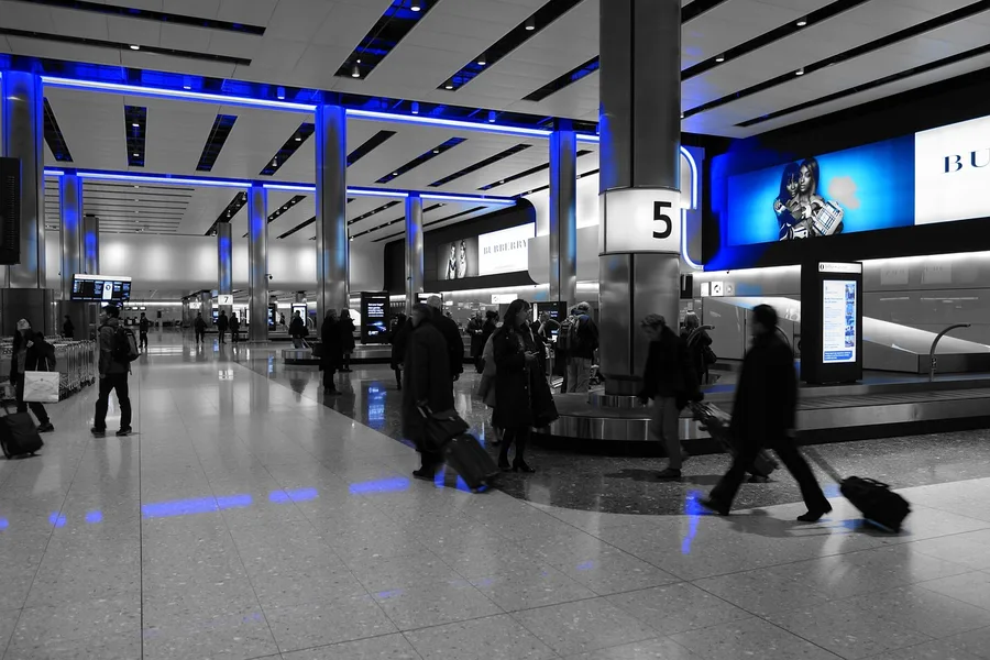 Senior couple with light luggage at airport terminal Turkey