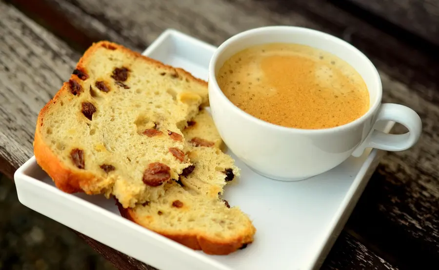 close-up of fresh kumiss cup and bread on market table