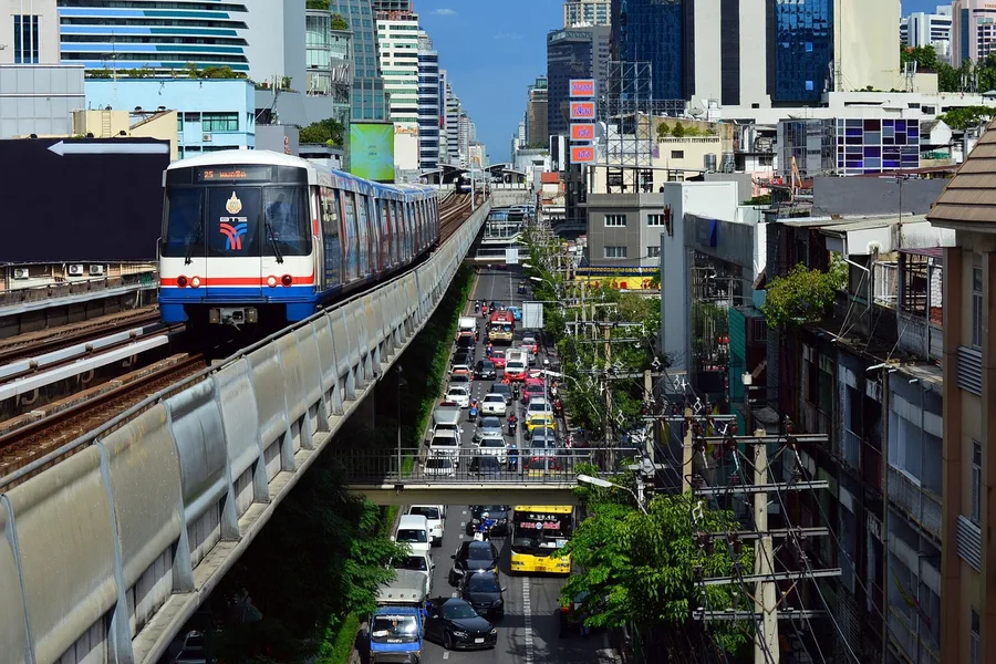 elderly tourist using BTS Skytrain Bangkok Thailand Osh Kyrgyzstan