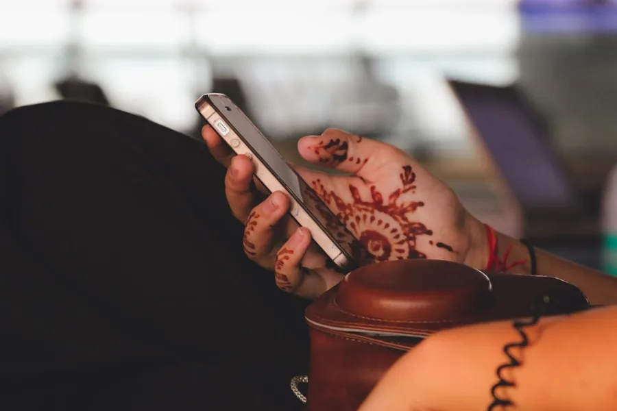 Turkish rental contract paper next to smartphone showing USDT transaction Delhi India