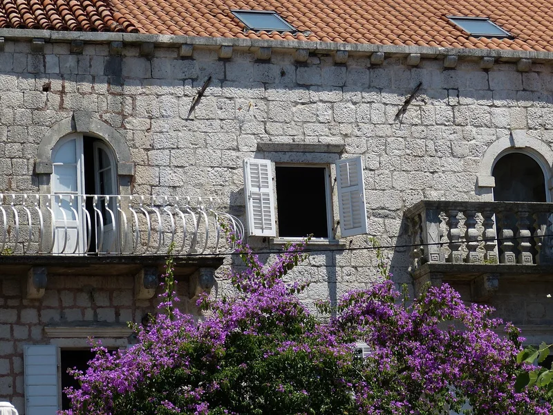 pensioner tourist proper clothing at church Larnaca Cyprus Kotor Montenegro