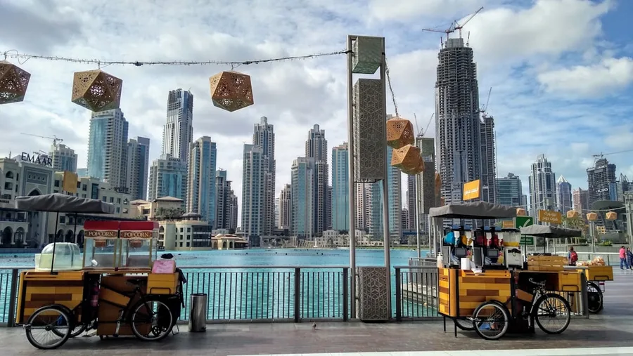 solo female tourist paying with cryptocurrency card in Dubai UAE 2026